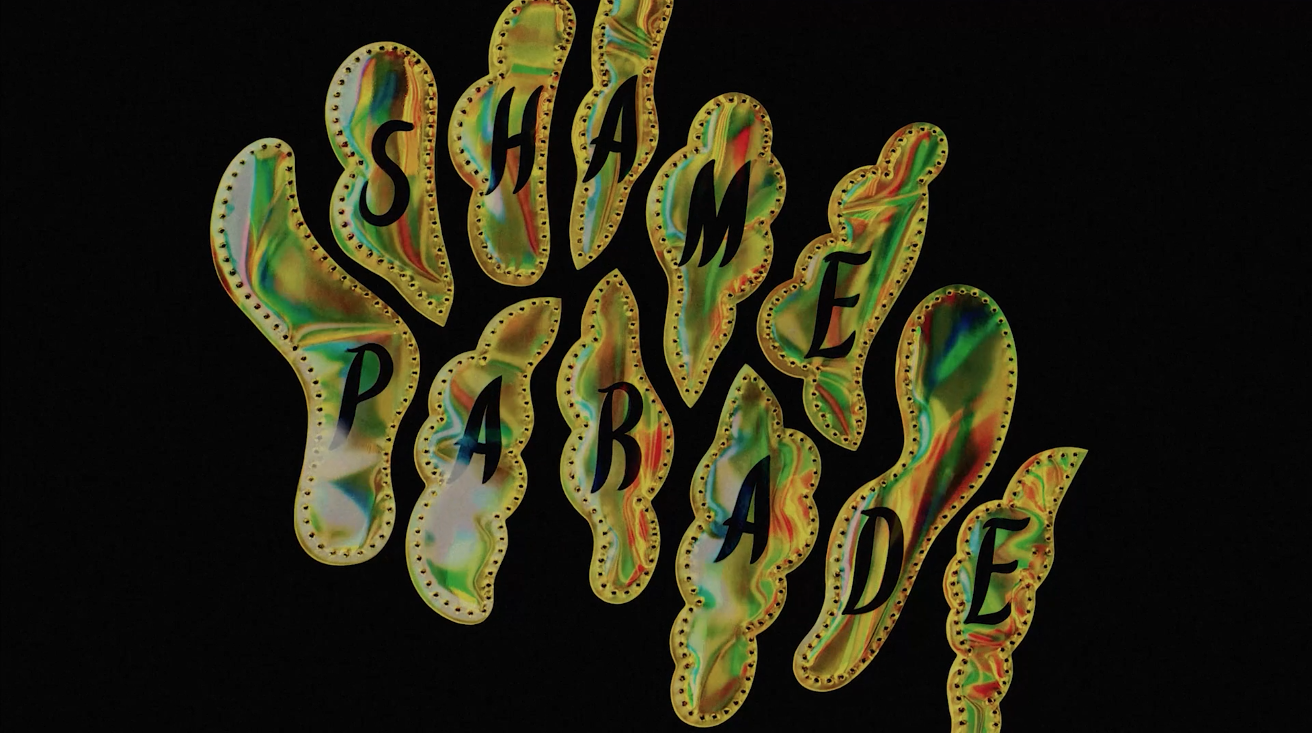 Text reads Shame Parade on golden shapes on a black background
